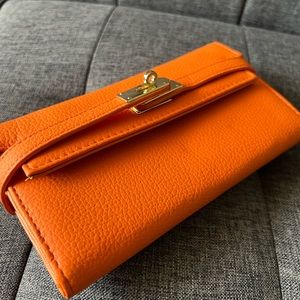 Orange clasp wallet